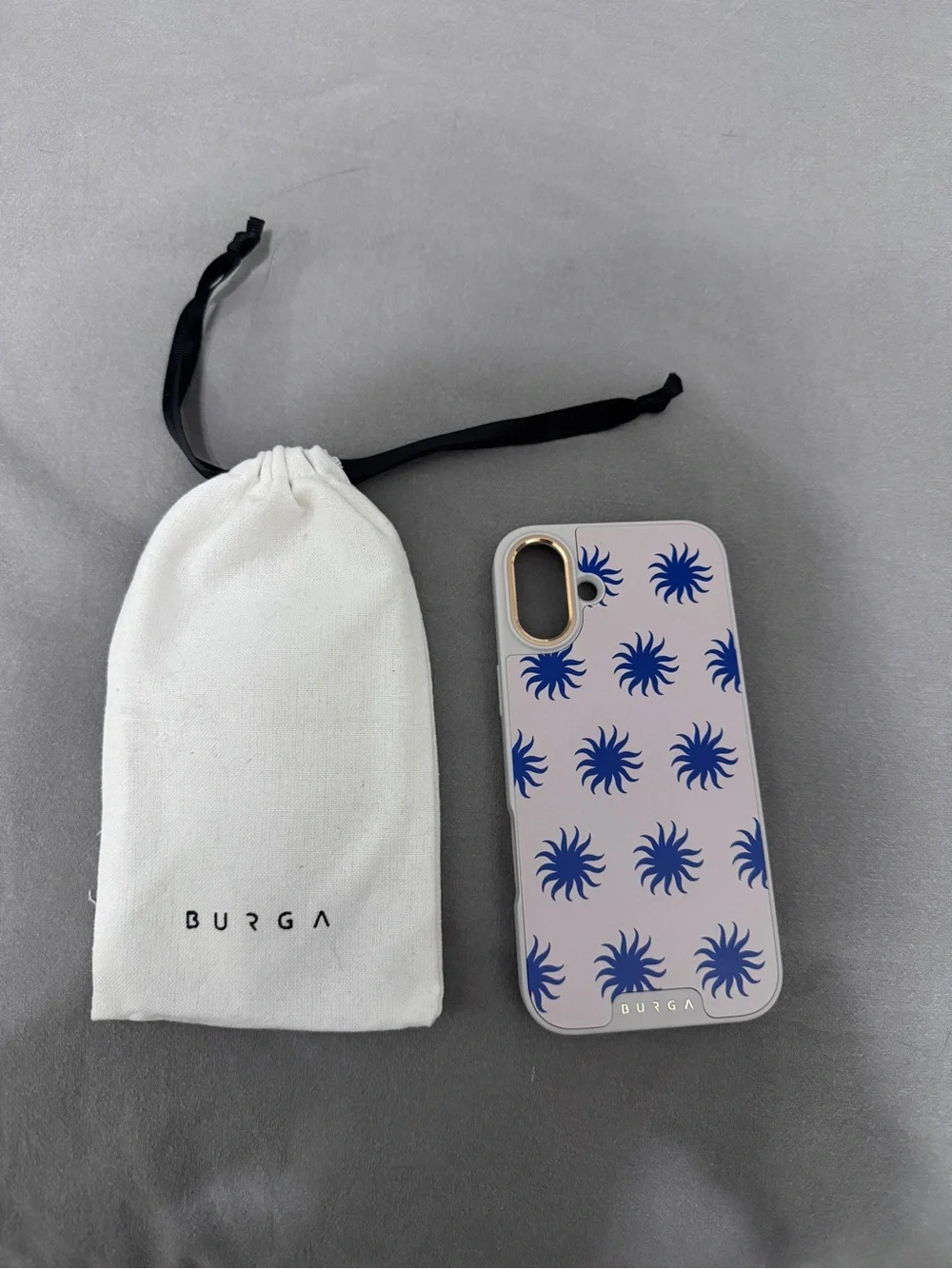 BURGA Pink Phone Case with Blue Sunburst Pattern